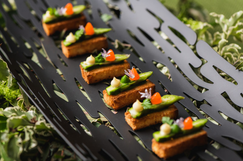 asparagus, egg yolk purée, parmesan and brioche toast canapé by moving venue caterers